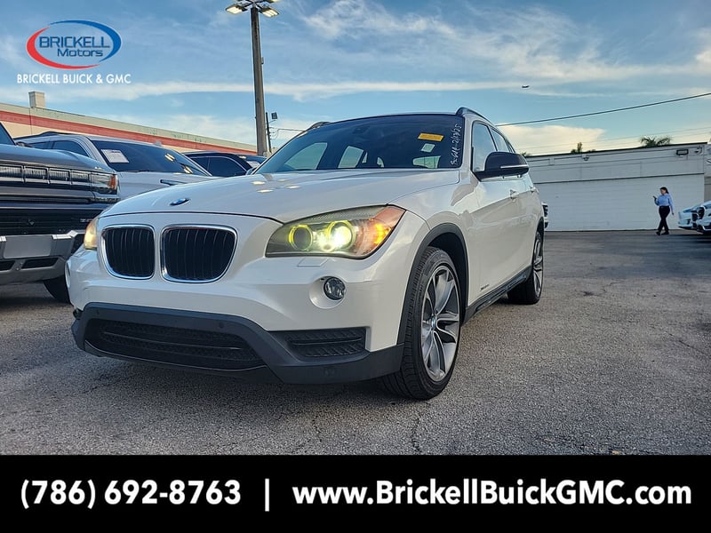 Used 2013 BMW X1 35i with VIN WBAVM5C57DVV89908 for sale in Miami, FL